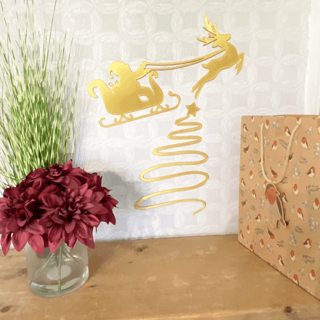 Celebrate Christmas with our joyful Santa wall art collection. Santa Sleigh with Reindeer and Christmas Tree Wall Art