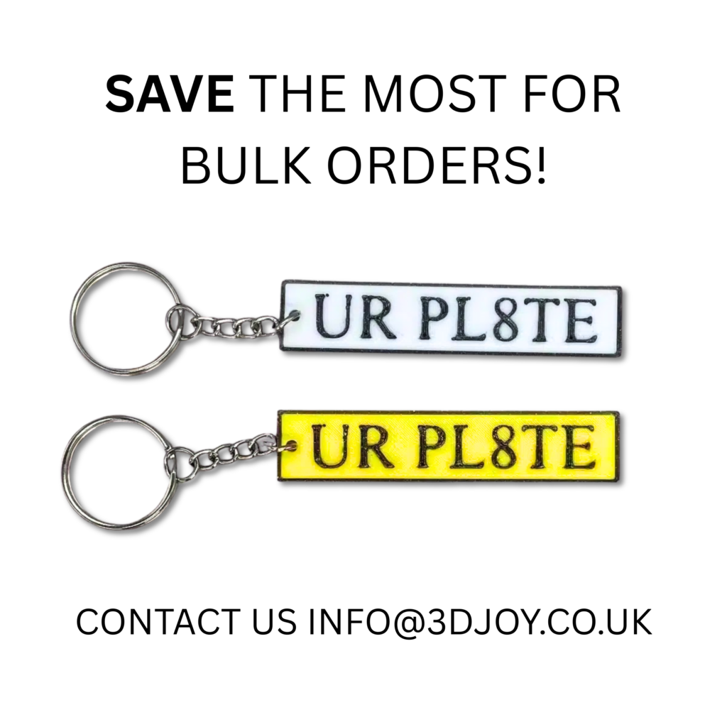Personalised number plate keyrings in white and yellow with custom text for car keys and gifts